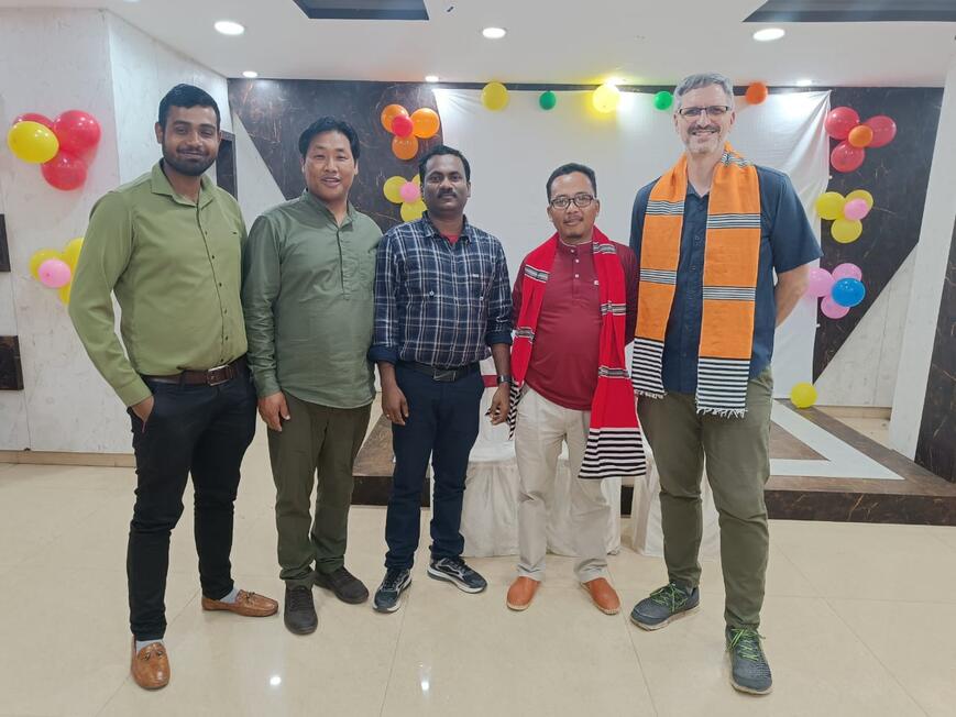 WITH STAFF